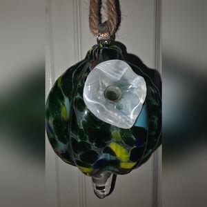 Elegant Glass Art Hummingbird Feeder with White and Green Accents